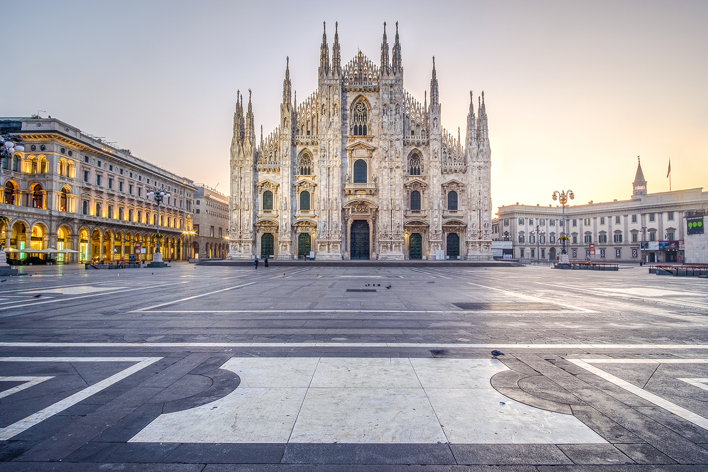 Sunrise in Piazza del Duomo in Milan, Italy. December 2017.